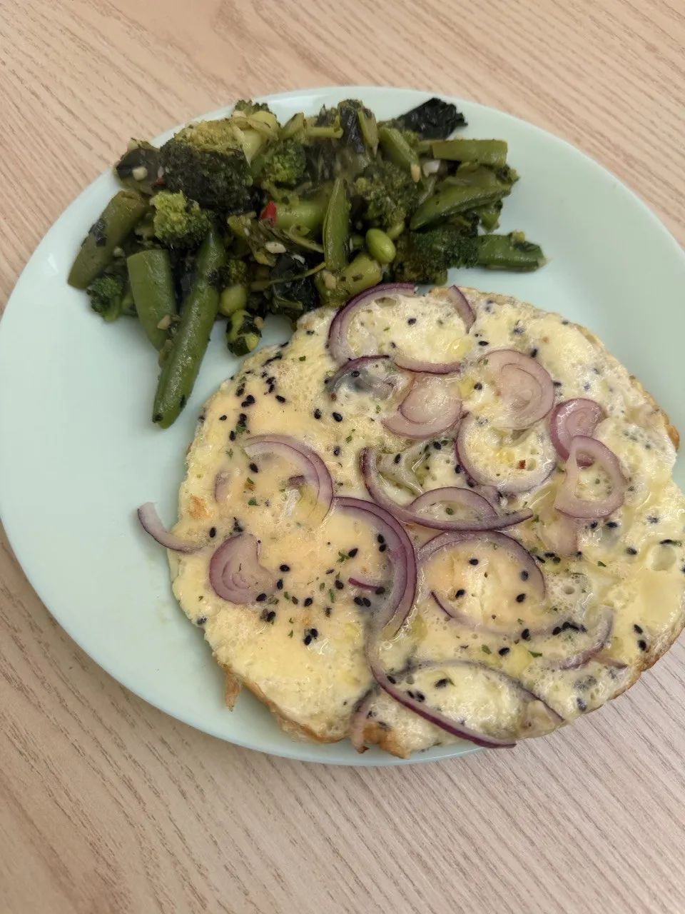 Omelette with red onion and green veg